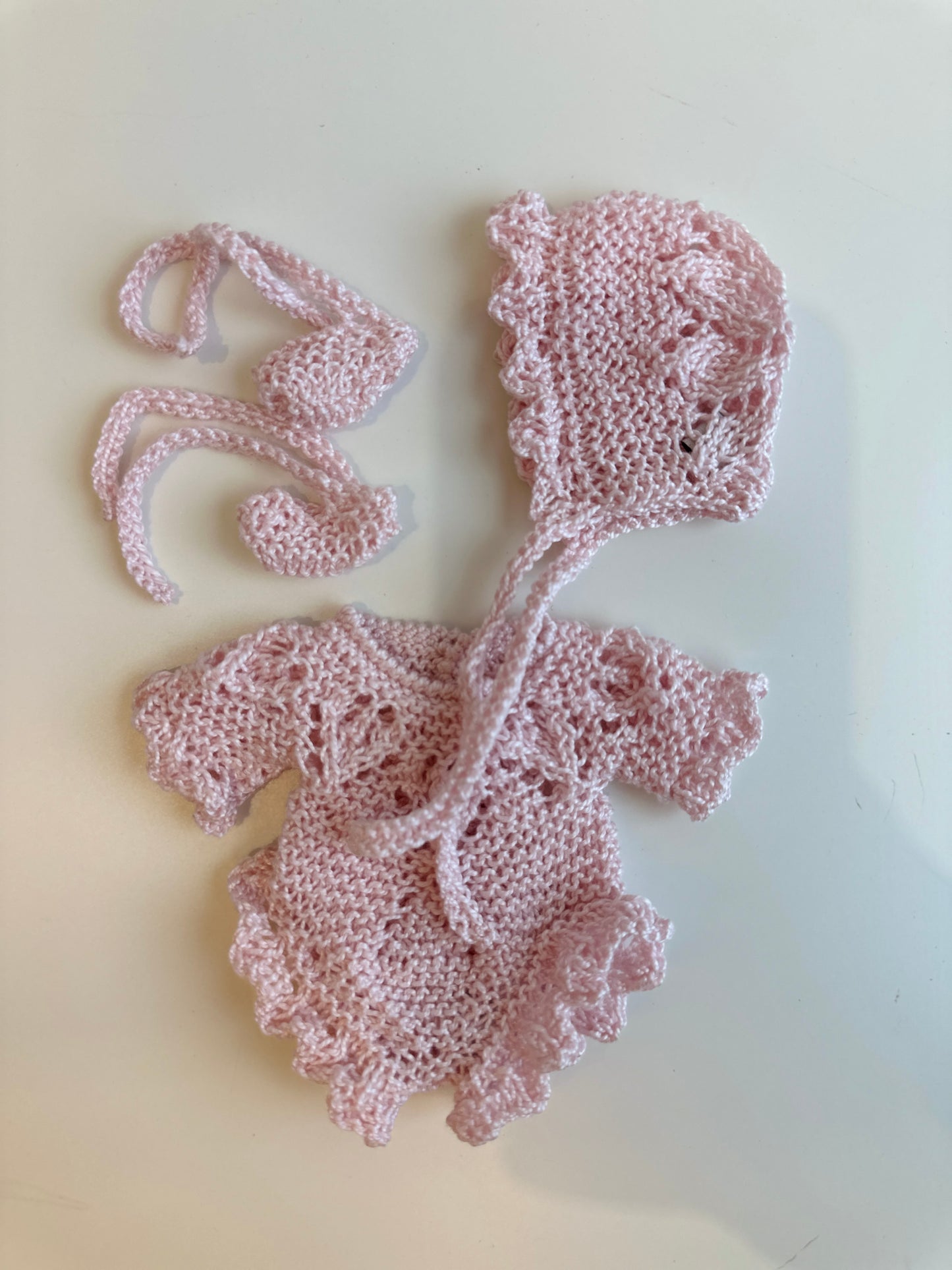 Conjunto body con capota y patucos perlé rosa bebé para muñeco de 21cm