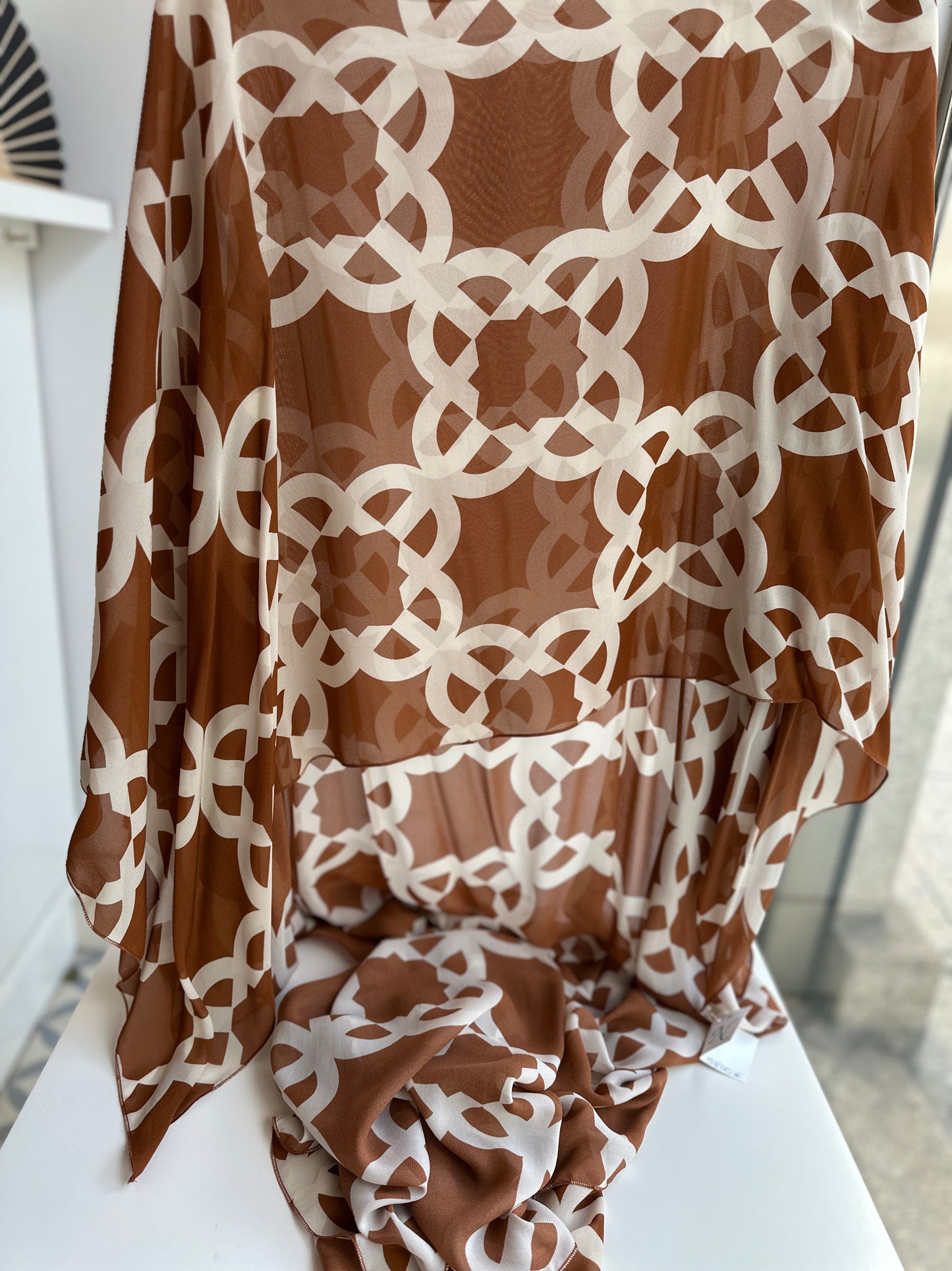 Capa estampada marrón