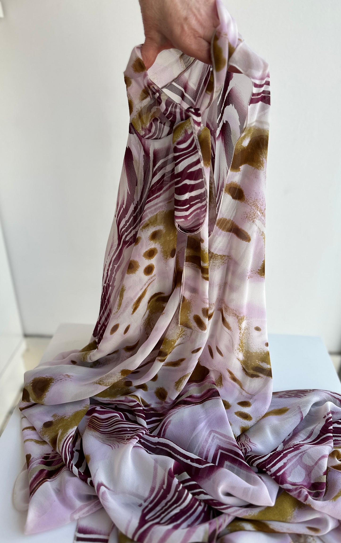 Capa con lazo estampado