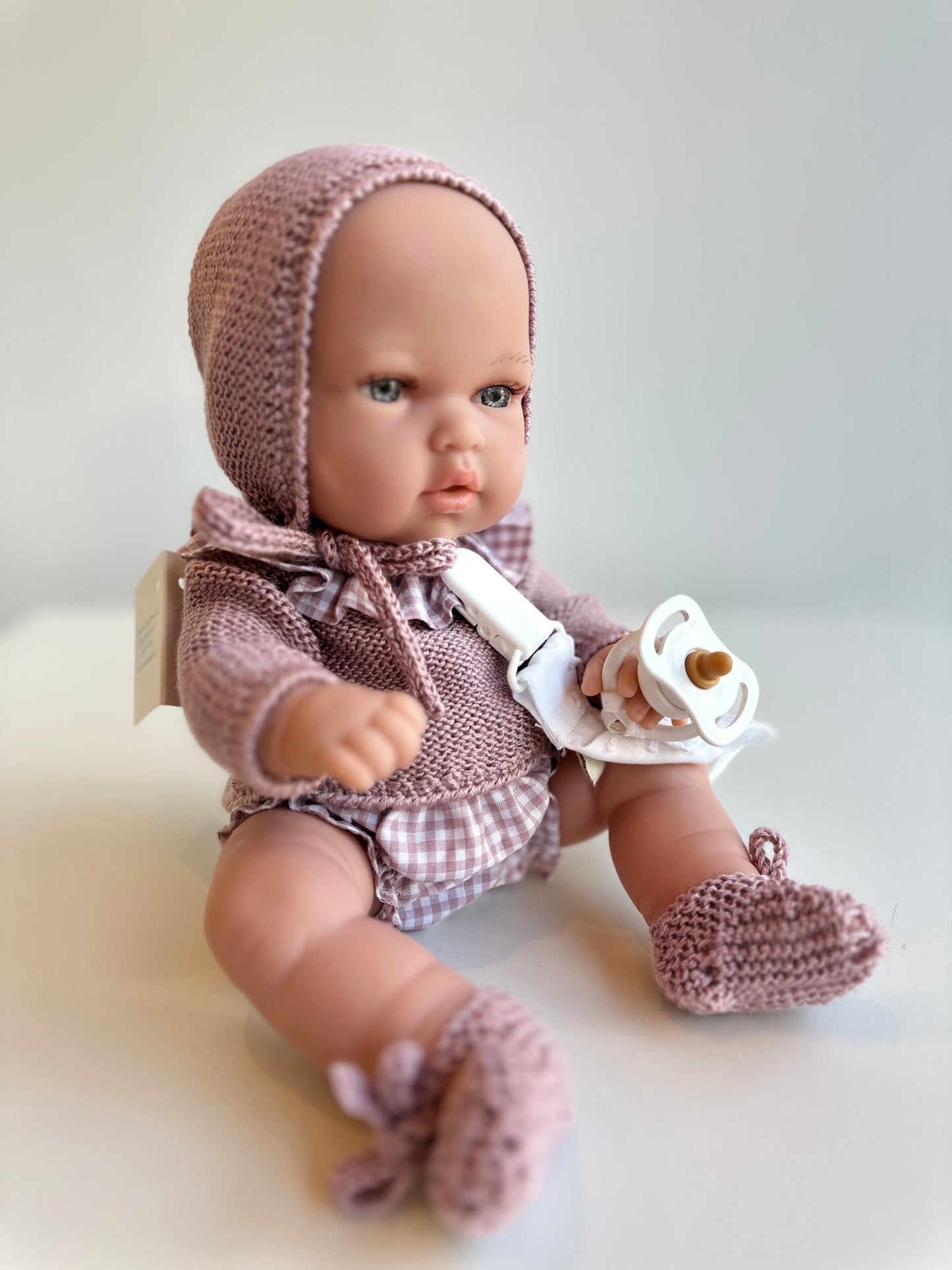 Muñeca 33 cm vestida punto simple