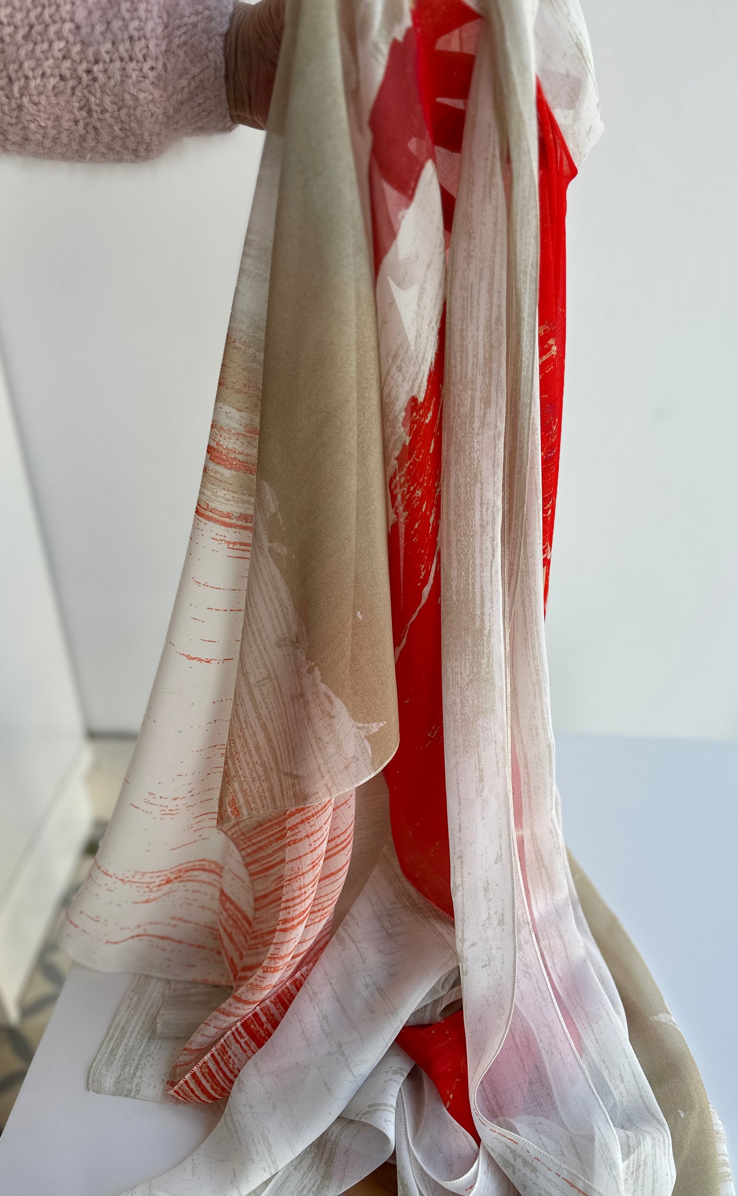 Capa con lazo estampado tonos naranjas