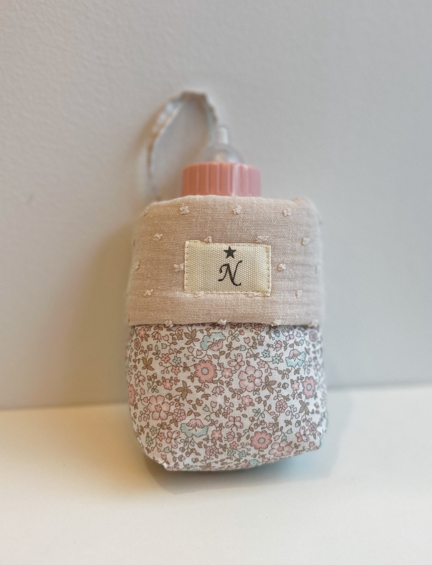 Portabiberón para muñecos