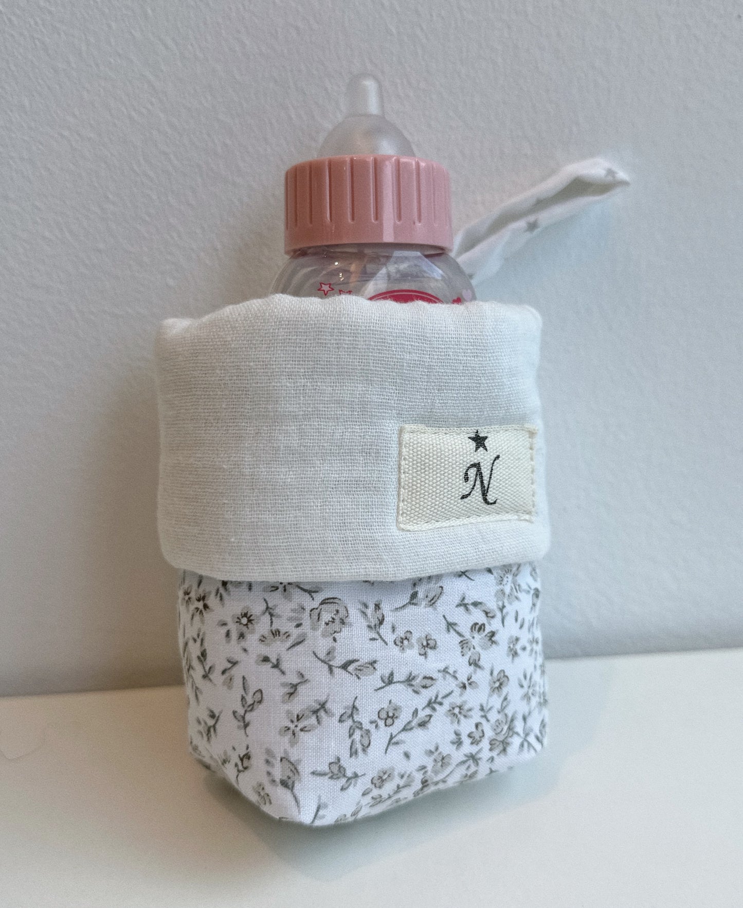 Portabiberón para muñecos