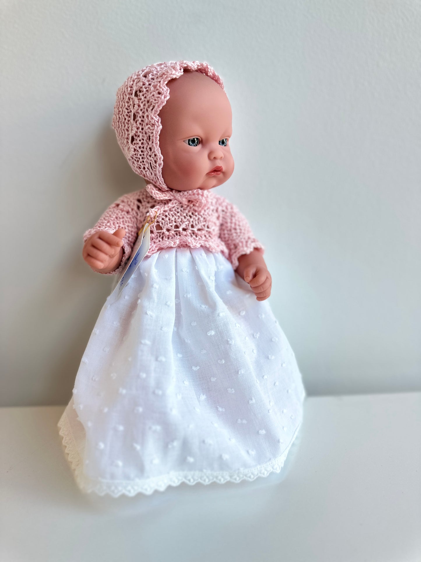 Muñeco 28 centímetros Así con faldón y cuerpo de punto rosa